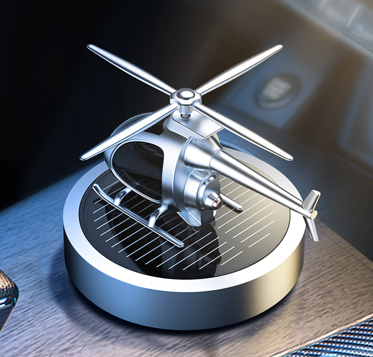 Ambientador de aire para coche con forma de helicóptero que funciona con energía solar y que gira con un perfume genial