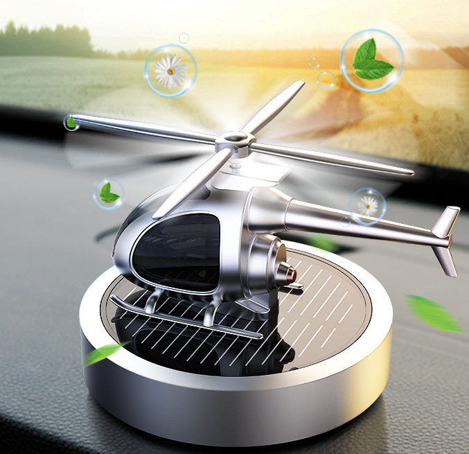 Ambientador de aire para coche con forma de helicóptero que funciona con energía solar y que gira con un perfume genial