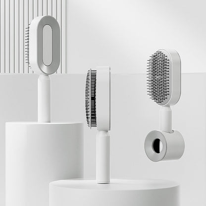 Cepillo para el cabello autolimpiante 