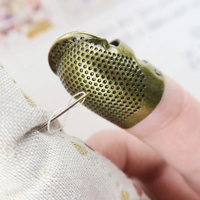 Protector de dedos para coser