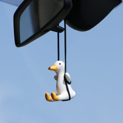Pato de coche oscilante