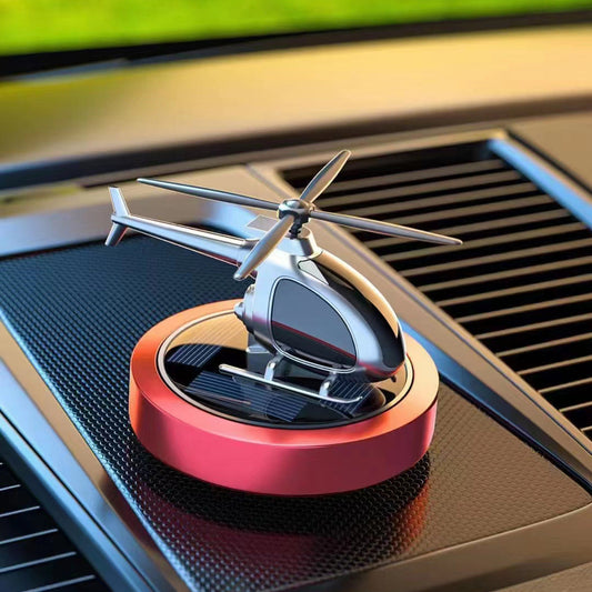 Ambientador de aire para coche con forma de helicóptero que funciona con energía solar y que gira con un perfume genial